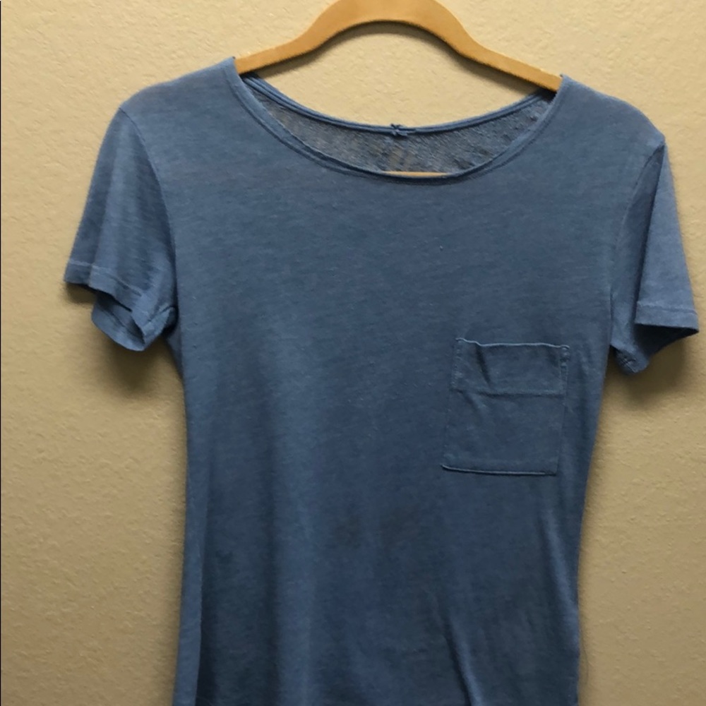 Raquel Allegra short sleeve shredded back top.